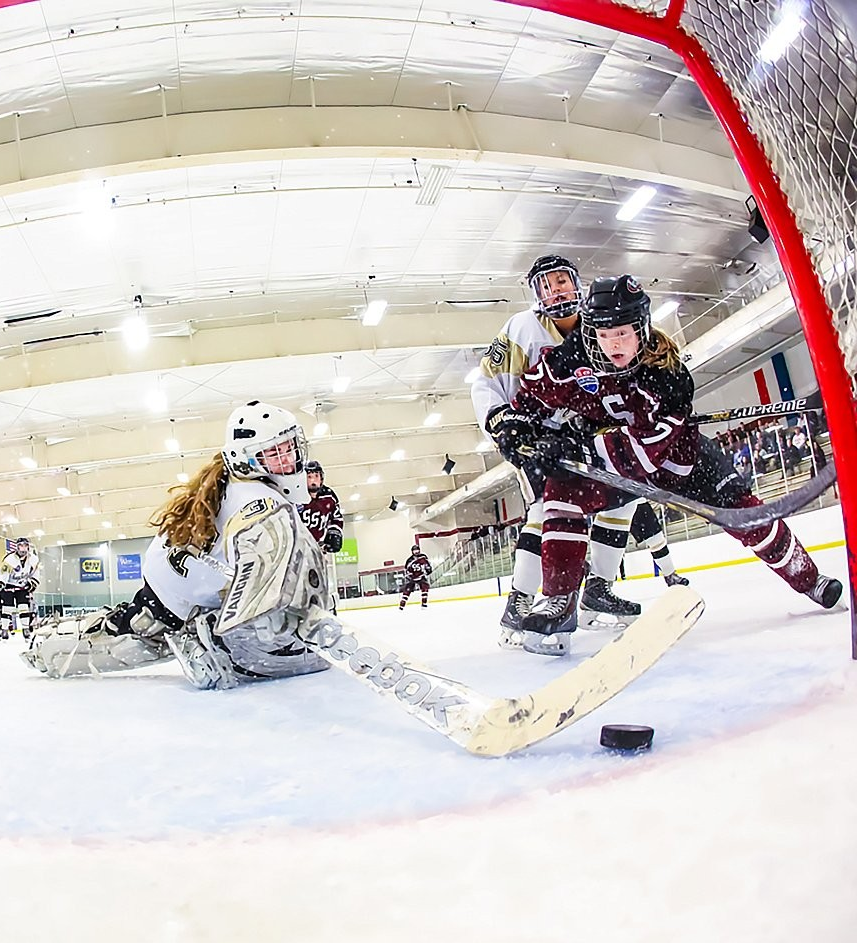 hockey goal camera action shot