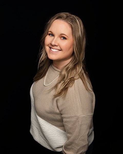 Headshot of Kirsten, production and order fulfillment specialist for Sportsline Photography