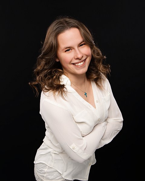 Headshot of Summer, professional sports photographer and photo editor