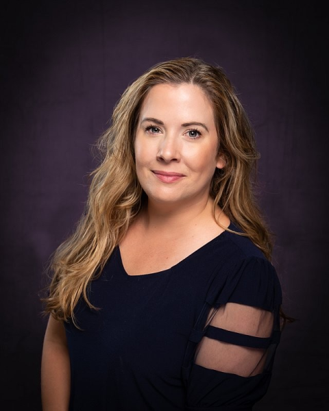 Headshot of Megan Freeman, owner of Sportsline Photography