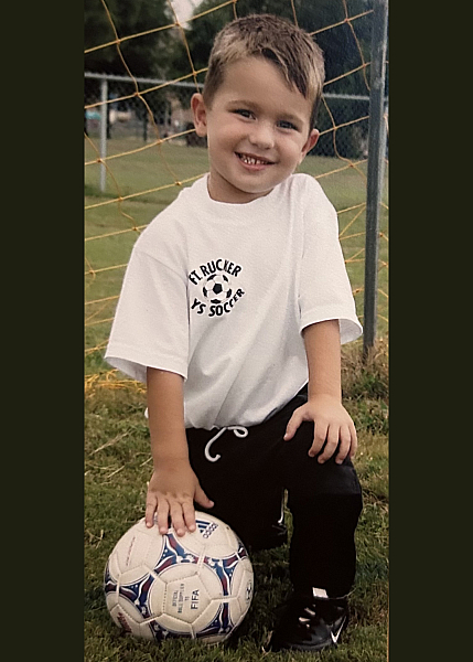 Childhood soccer portrait of Jack, lead sports photographer.
