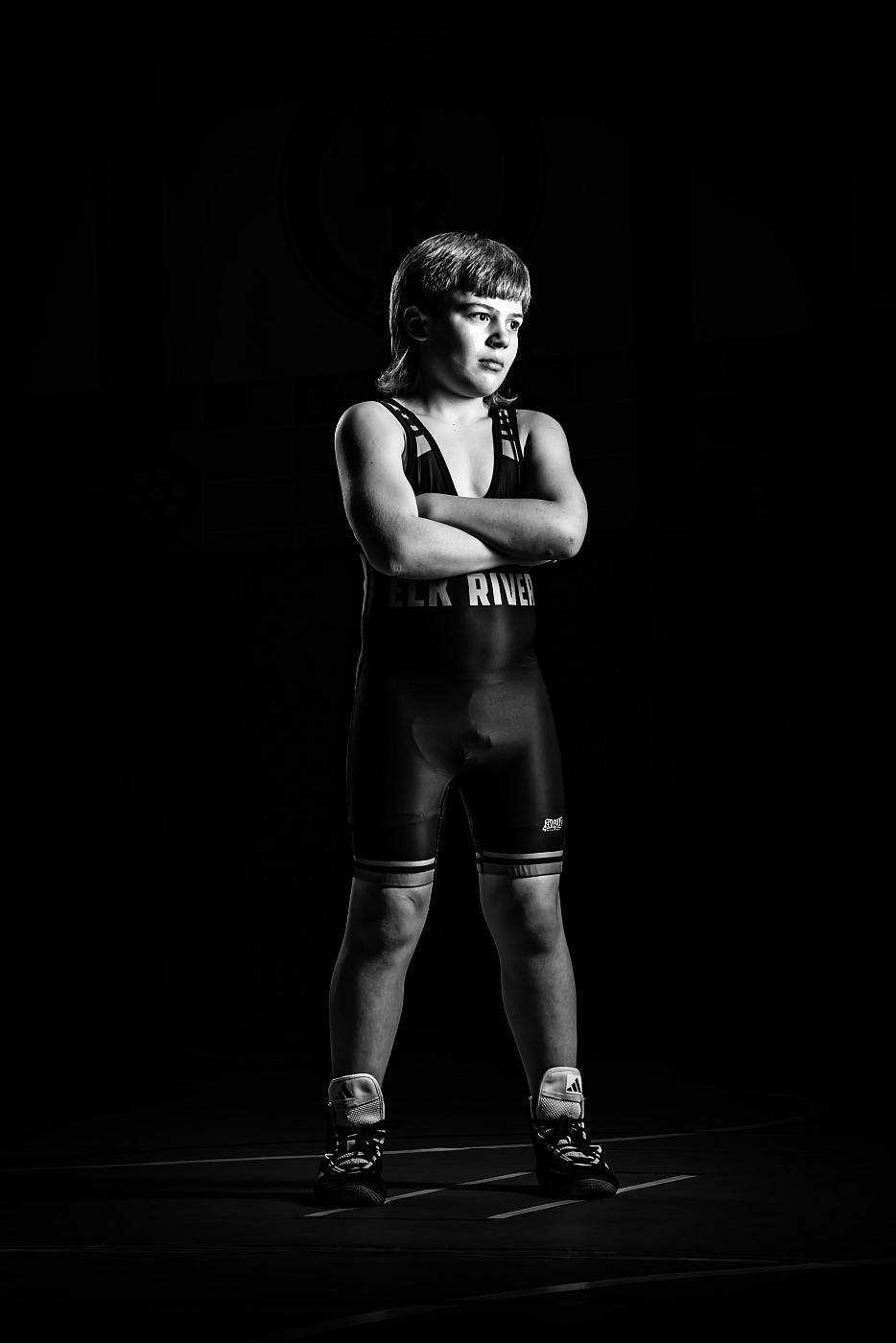 Black and white boys wrestling sports portrait.